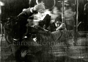 1951_strangers_on_a_train_hitchcock_carousel_movie_still_03